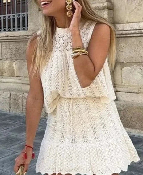 Conjunto em tricot saia curta e blusa estilo bata AB306