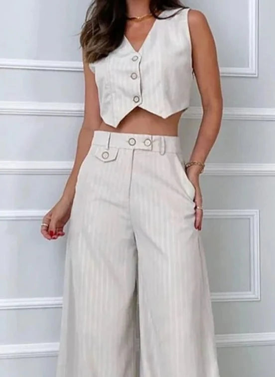 Conjunto gola V com colete abotoado e calça flare AB677
